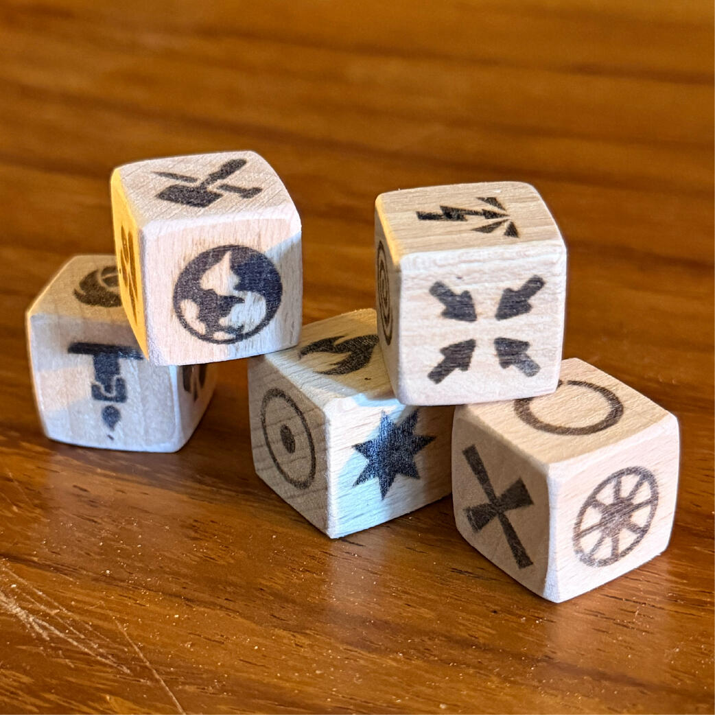 Engraved faces of the Fatem Bones chaos magic dice showing the five formula dice, WMFrewolfe