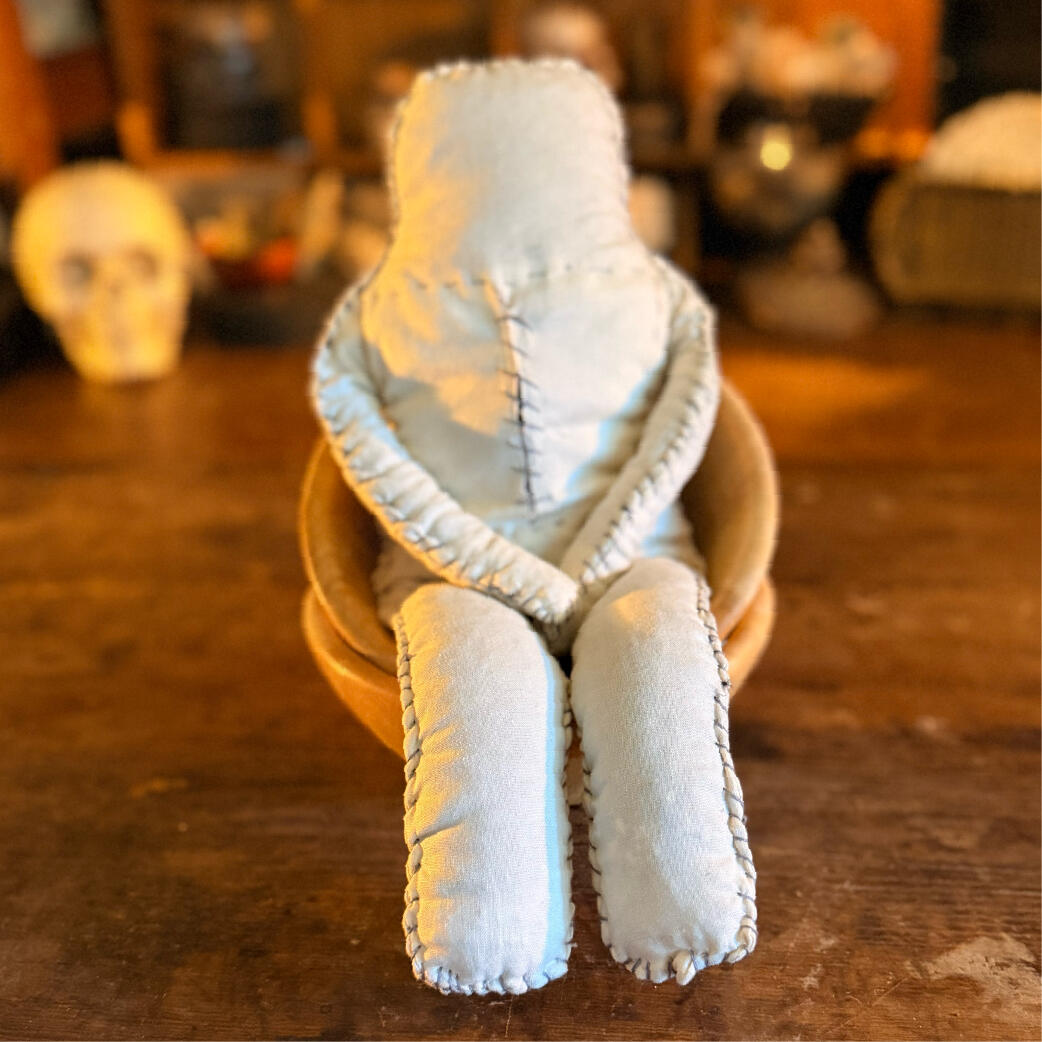 Plain seated cloth poppet weighted with salt and herb, a ritual surrogate vessel, Ragfolk by WMFrewolfe