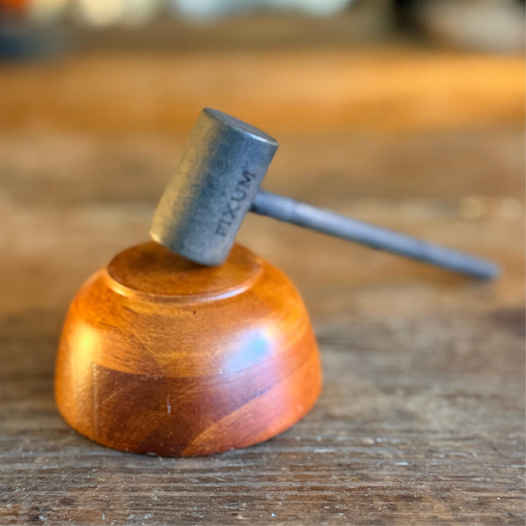 Small aged gavel resting on a wooden base, ritual declaration tool, The Declarant by WMFrewolfe