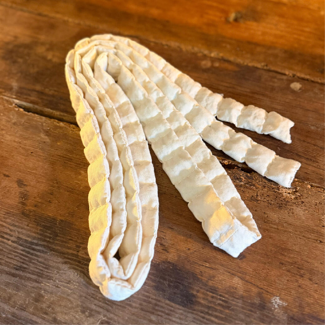 Full length of a sewn salt channel laid out showing its segments, handmade reusable ward, Saltcord by WMFrewolfe