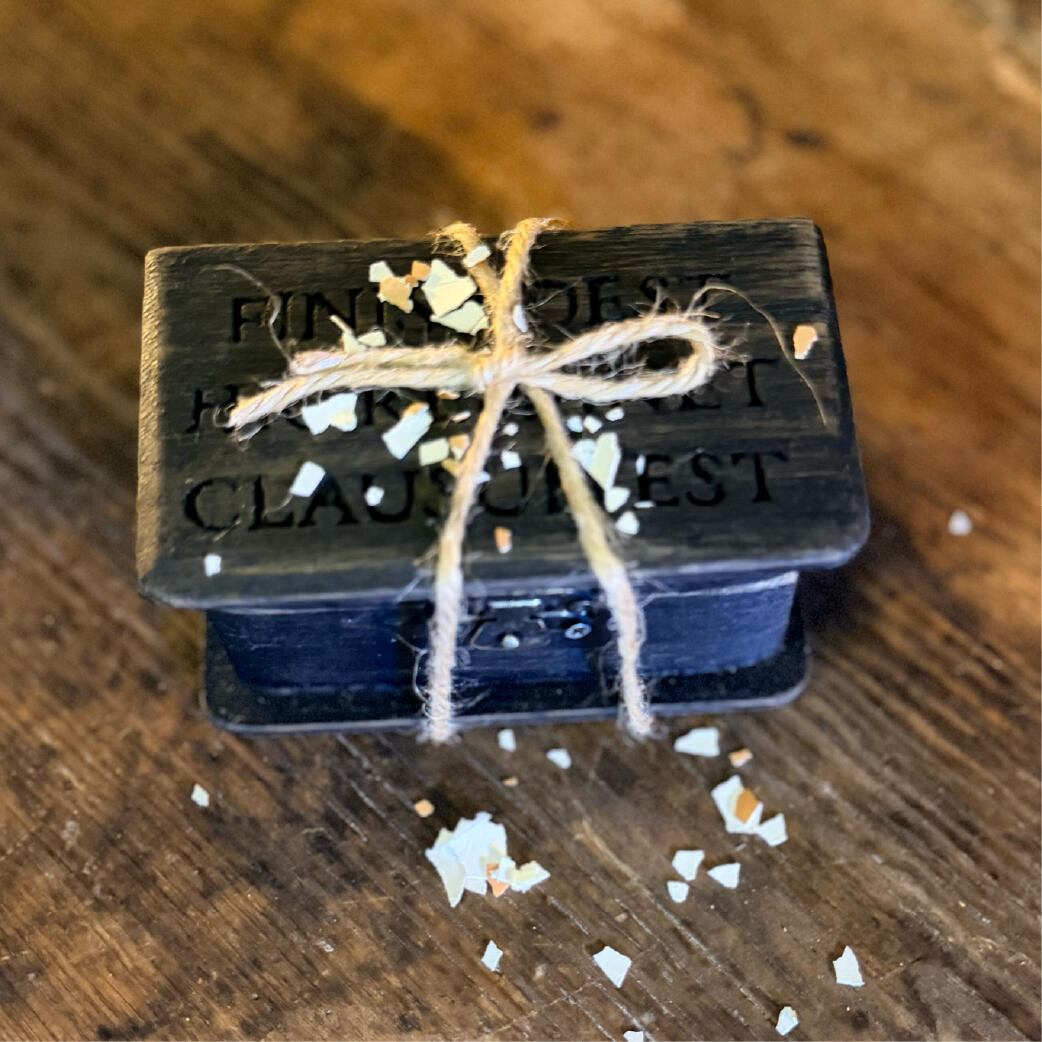 Aged Bane Box tied closed with twine and scattered eggshell, handmade sealing box by WMFrewolfe